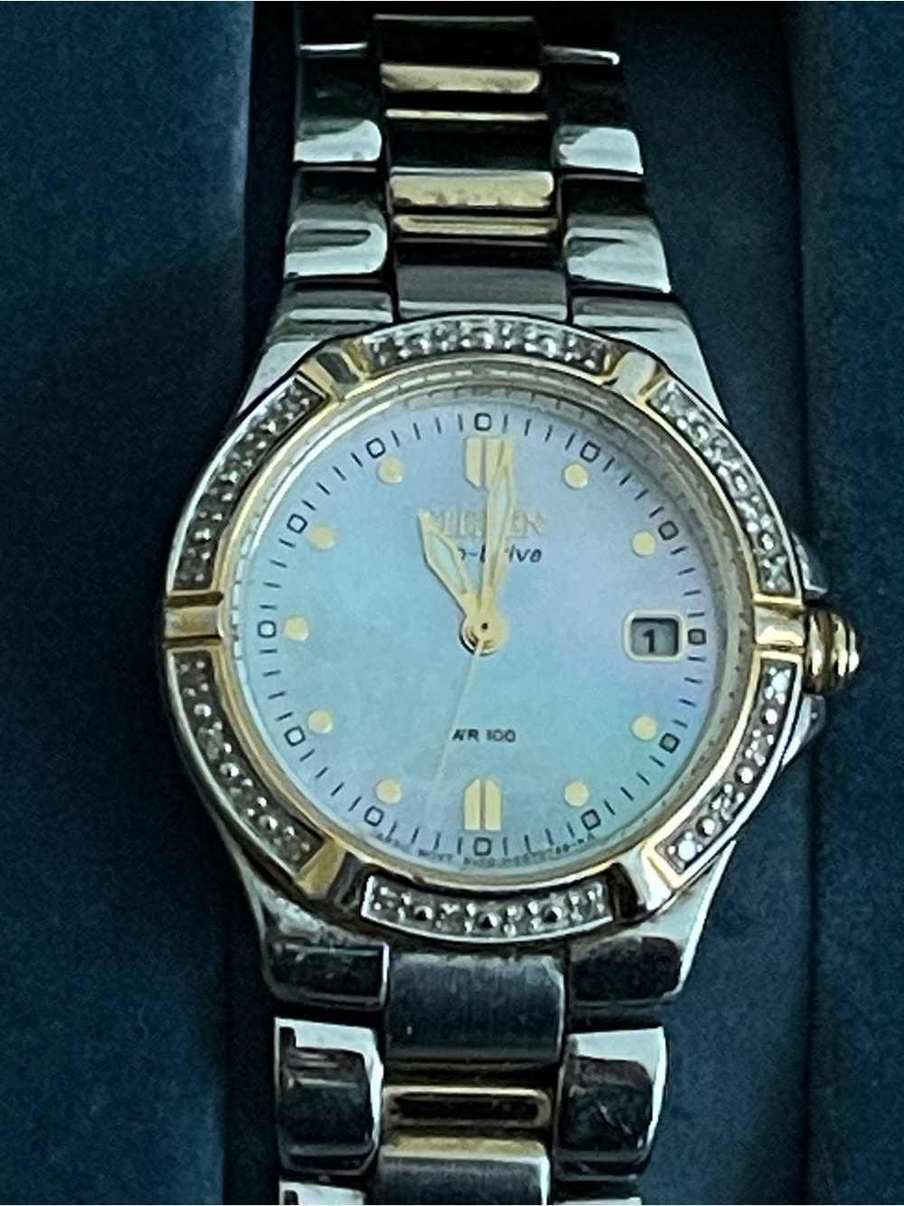 Citizen Eco-Drive Women's Watch Mother of Pearl Dial TwoTone Diamond Bezel WR100